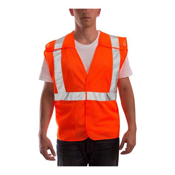 An orange Tingley Job Sight safety vest with reflective stripes.