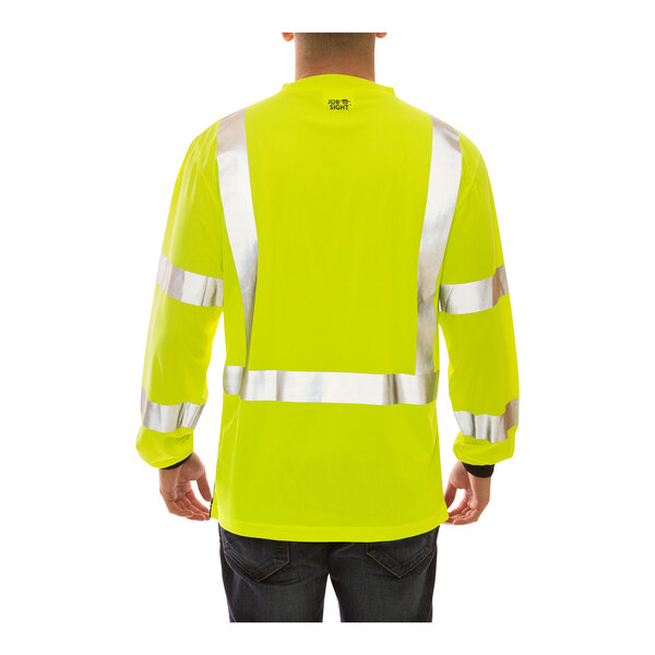 A man wearing a Tingley hi-vis yellow and black safety shirt.