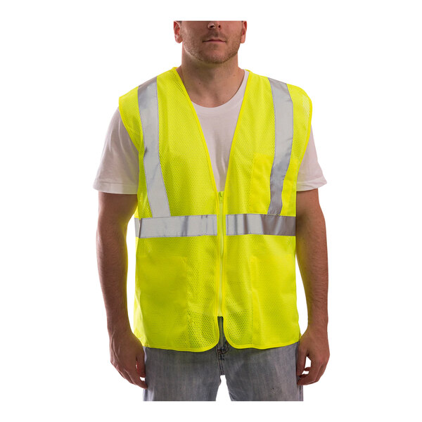 A man wearing a Tingley lime yellow mesh safety vest with zipper closure.