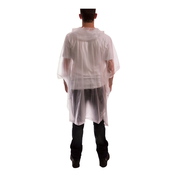 A man wearing a Tingley clear rain poncho.