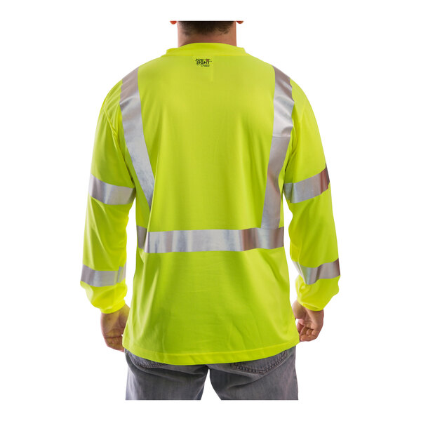 A man wearing a Tingley Job Sight reflective yellow safety shirt.