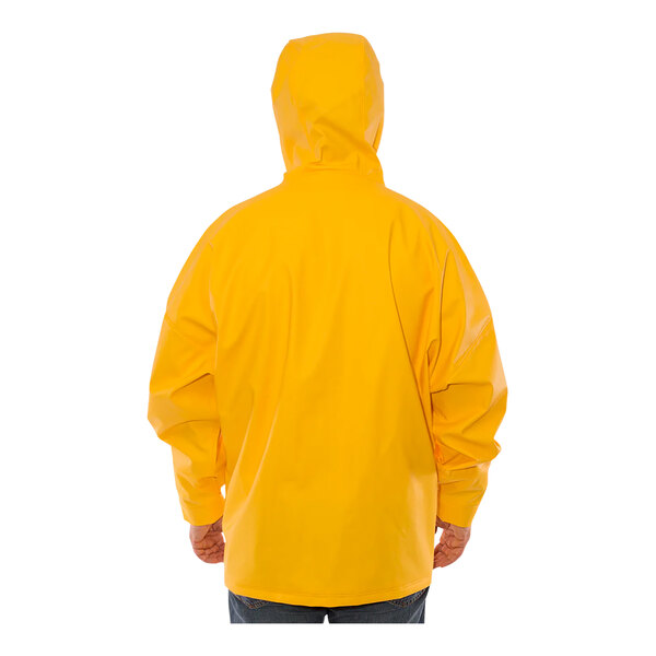 A man wearing a yellow Tingley Weather-Tuff rain jacket.