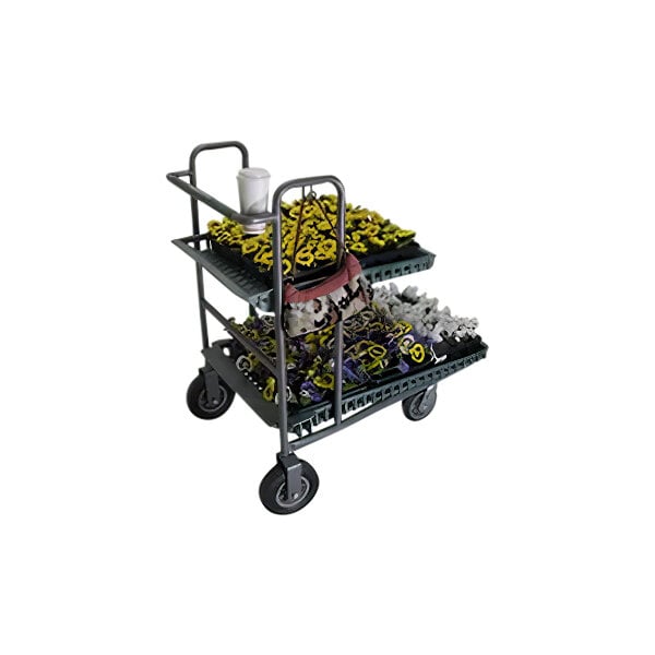 A R.W. Rogers 2-tier nesting garden cart with black wheels full of flowers.