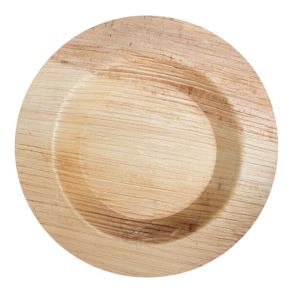 A VerTerra round palm leaf plate with a circular center.