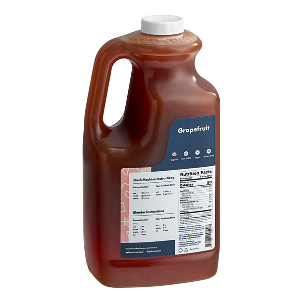 A jug of Kelvin Slush Co. Organic Frozen Grapefruit Cocktail Mix on a white background.