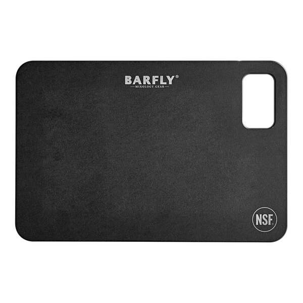 A black Barfly bar board with white text on a counter.