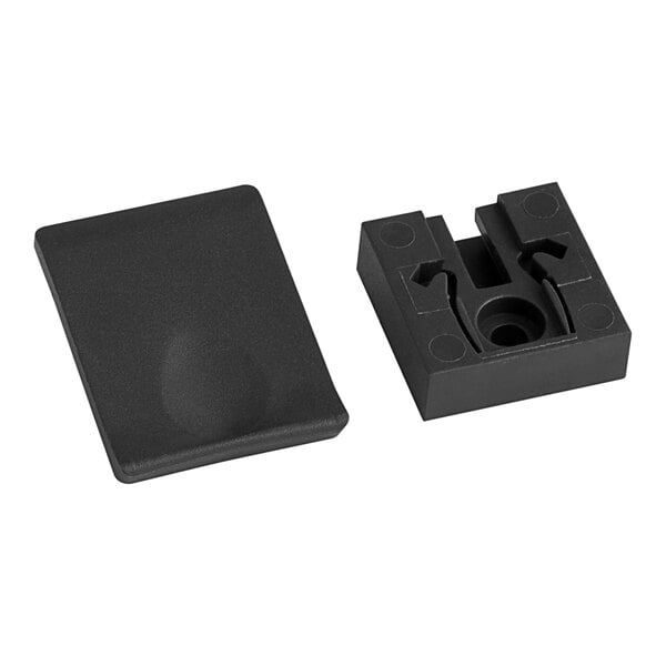 A black plastic square with a circle in the middle.