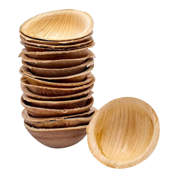 A stack of VerTerra palm leaf bowls.