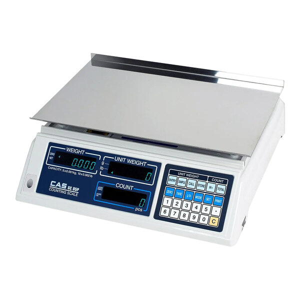 A white Cas digital precision counting scale on a counter with a blue and black display.
