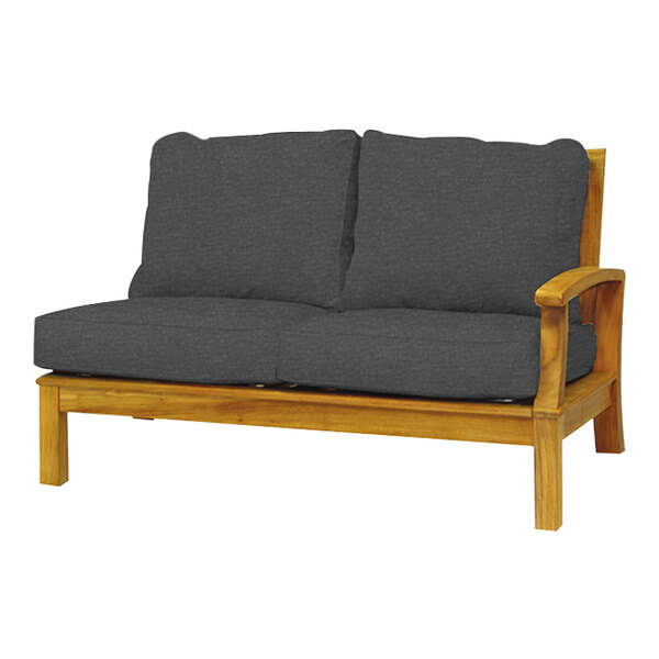 A grey Monterey settee with a wooden frame.