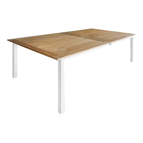 A Three Birds Casual teak dining table with white legs and an extension.