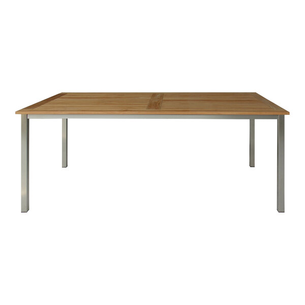 A Three Birds Casual rectangular teak dining table with wooden legs.