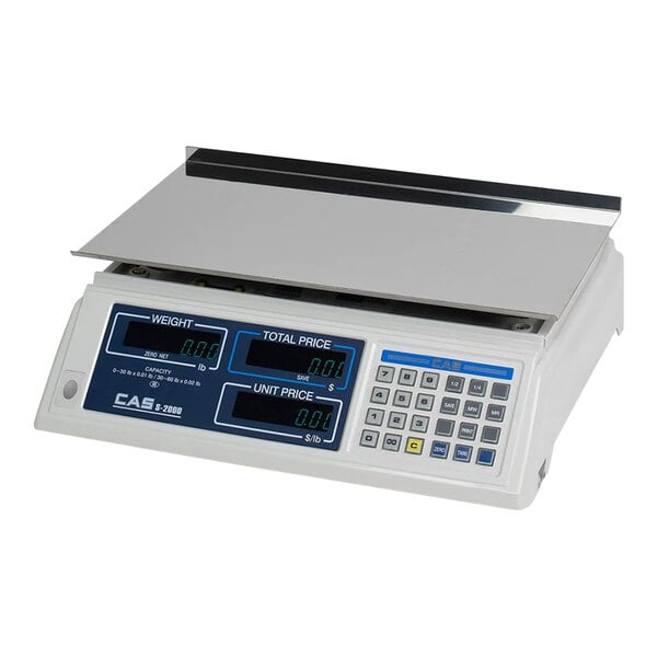 A white Cas S-2000 dual-range electronic scale with blue and black buttons.