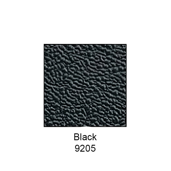 A close-up of a black surface with a textured square pattern.