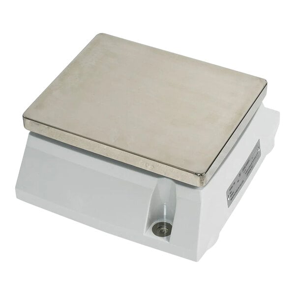 A white CAS SW-20 portion scale with a silver metal top.