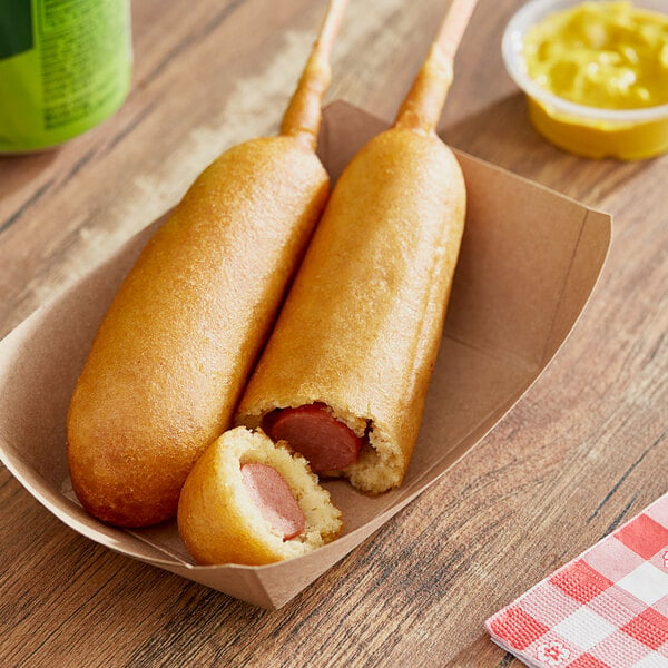 Two Vienna Beef corn dogs in a paper tray.