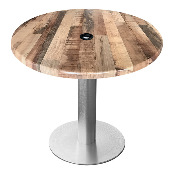 A round wooden Holland Bar Stool table with a brushed aluminum base.