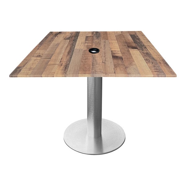 A wooden square table with a metal base.