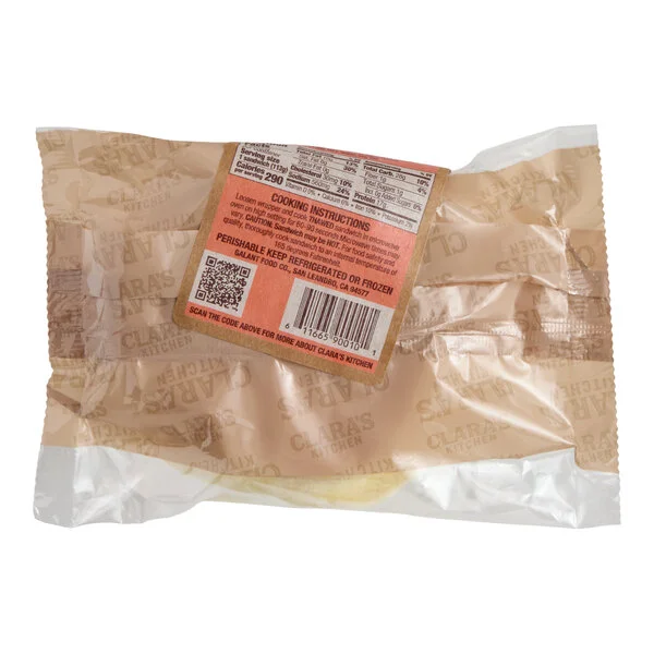 A packaged Clara's Kitchen bacon breakfast sandwich.
