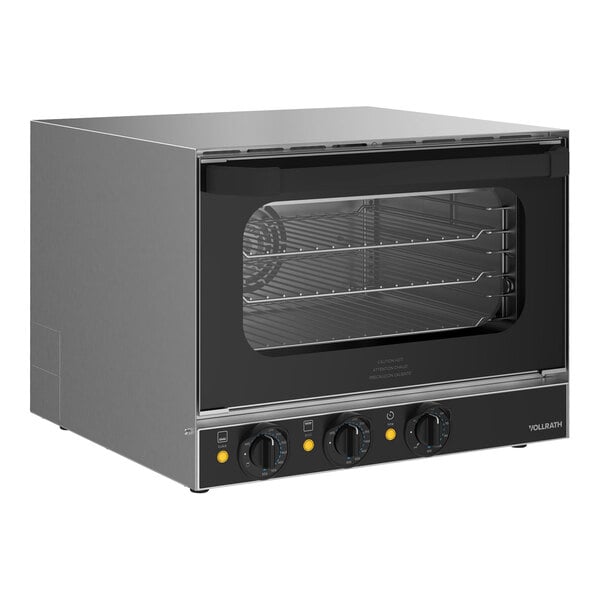 A black and grey Vollrath countertop convection oven with a glass door.