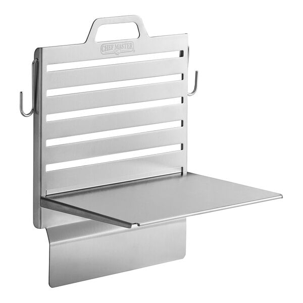 A stainless steel shelf for a griddle.