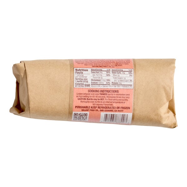 A wrapped Clara's Kitchen bacon breakfast burrito with a nutrition label on the packaging.