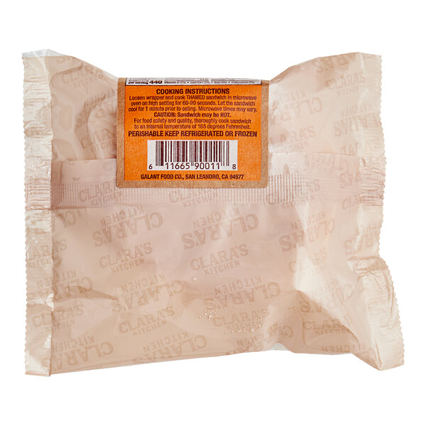 A white package of Clara's Kitchen Chorizo Breakfast Sandwiches with a label.