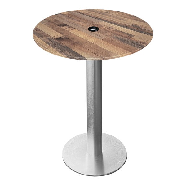 A round wooden Holland Bar Table with a metal base and pole.