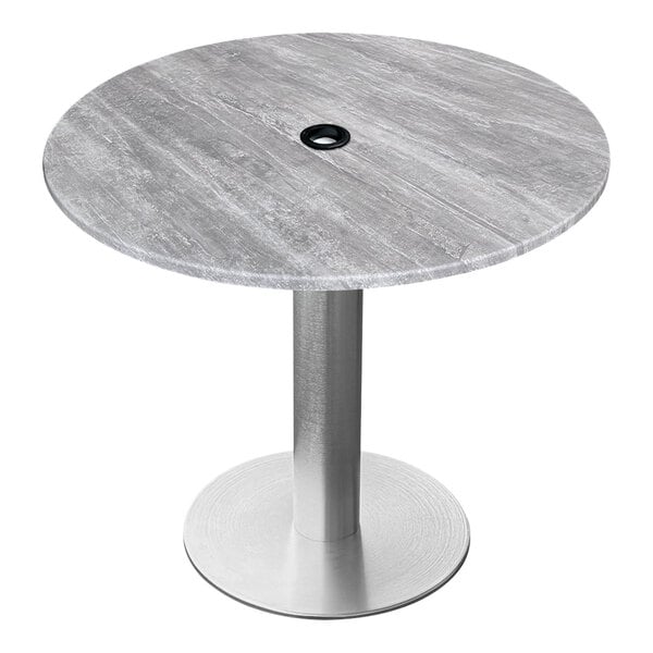 A Holland Bar EuroSlim round table with a brushed aluminum base and a greystone top.