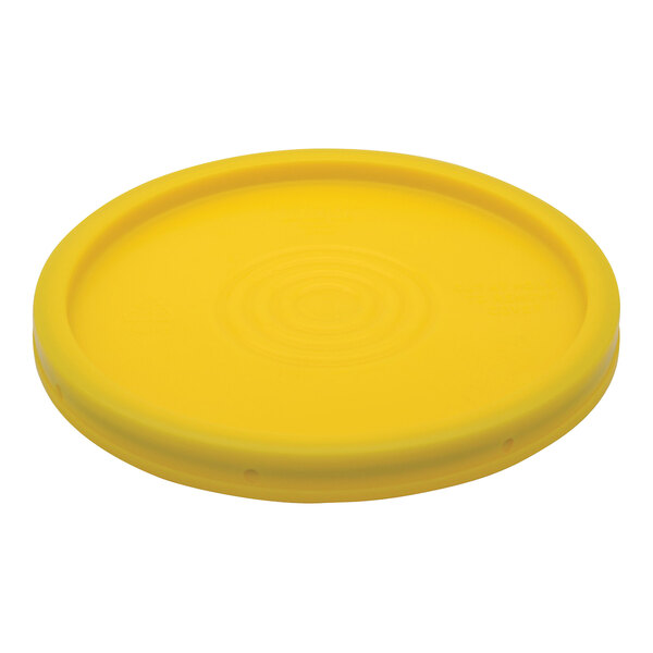 A yellow HDPE plastic lid for a pail with a circle in the middle.