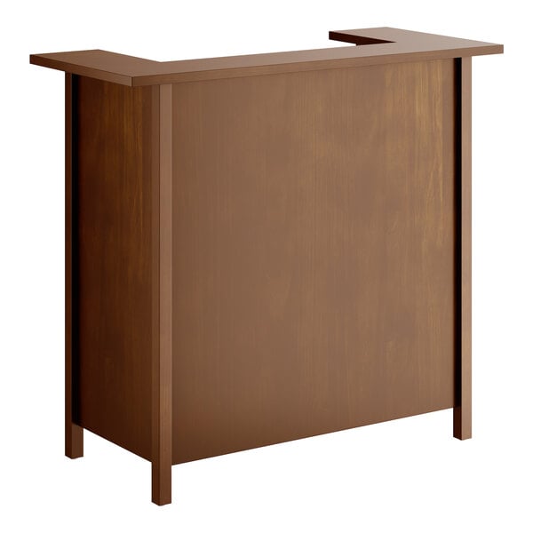 A Lancaster Table and Seating Vineyard Series wood portable bar with a vintage brown finish and a shelf on top.