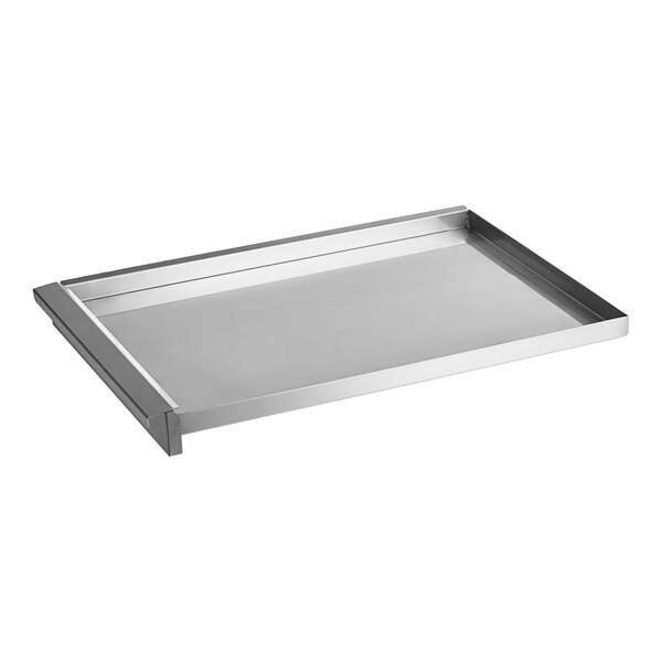 A stainless steel tray with a handle for a Cooking Performance Group rotisserie oven.