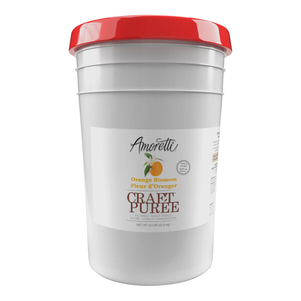 A white bucket with a white label and a red lid of Amoretti Orange Blossom Craft Puree.