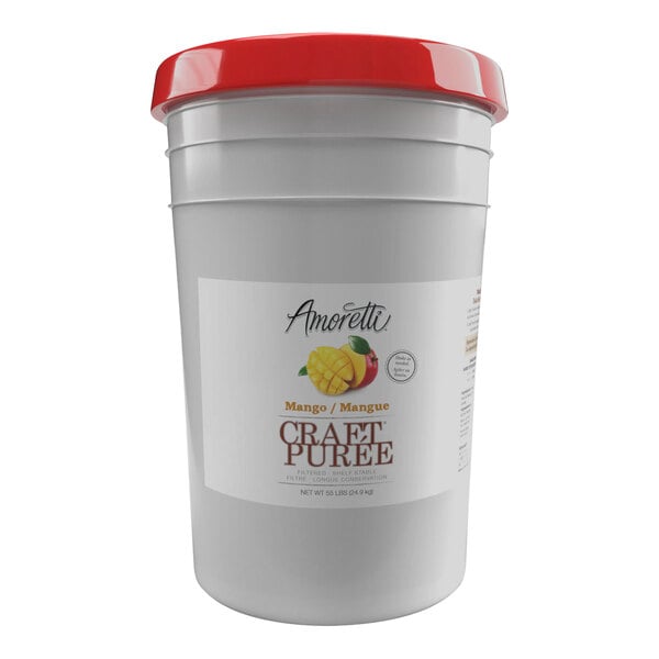 A white bucket of Amoretti Mango Craft Puree with a red lid.