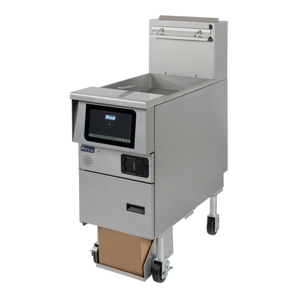 A Pitco stainless steel gas floor fryer with a screen over the oil.