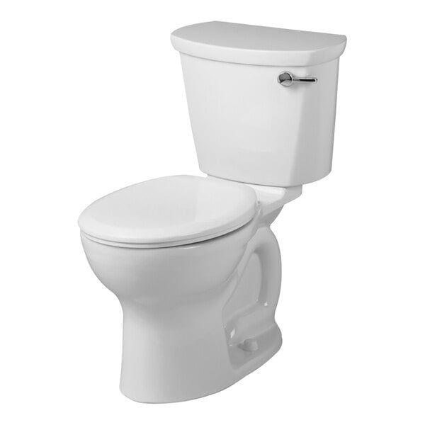 An American Standard white floor-mount chair height round toilet with a silver right-handed lever.