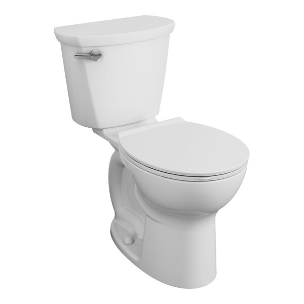 An American Standard white toilet with the seat down.