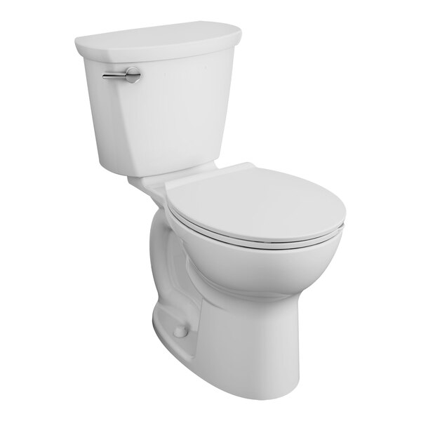 An American Standard white round toilet with the seat down.