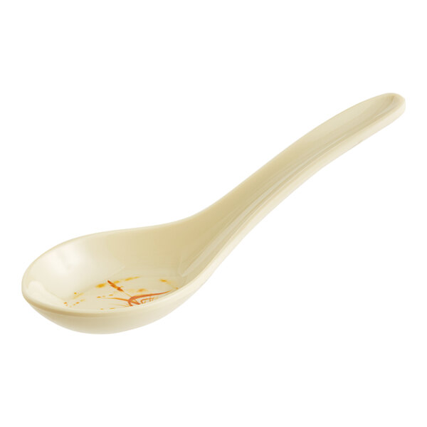 A beige Acopa melamine wonton soup spook with a gold design.