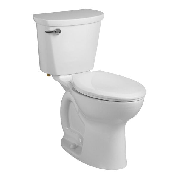 An American Standard white toilet with the seat down and a silver handle.