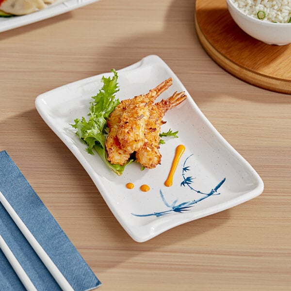 An Acopa Bambu Biru rectangular melamine plate with fried shrimp and rice on it.