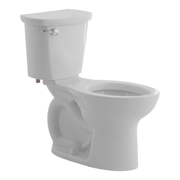 An American Standard linen vitreous china floor-mount chair height toilet with a silver handle and lid.