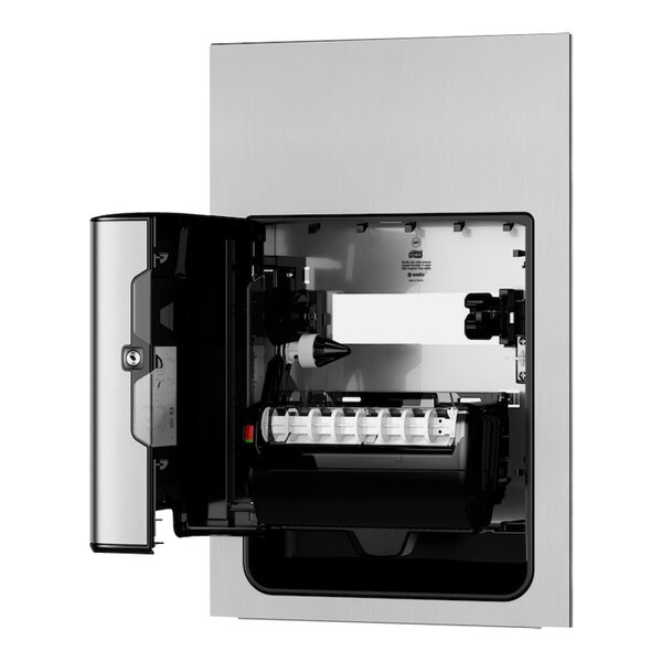 A stainless steel Tork Image Matic recessed paper towel dispenser.