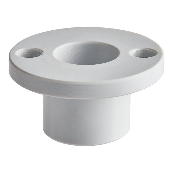 A white plastic MainStreet Equipment bushing distributor with two holes.