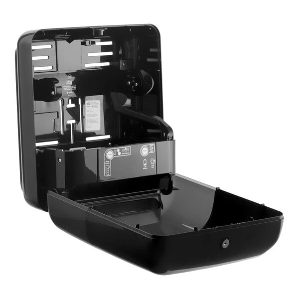A black wall-mount automatic hand towel roll dispenser with an open front panel.