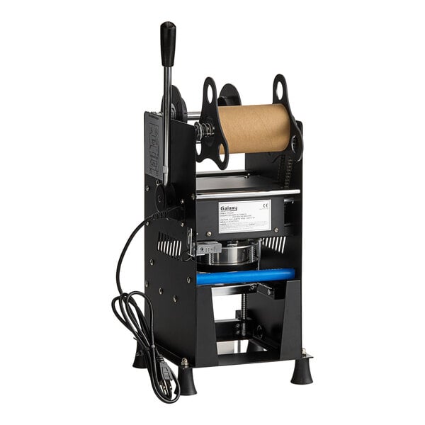 A black Galaxy Semi-Automatic Cup Sealing Machine with a roll of paper on it.