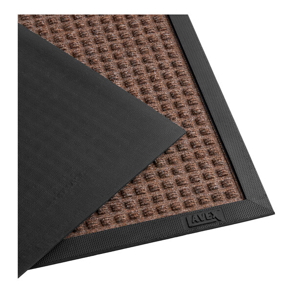 A brown Lavex waffle entrance mat with black edges.