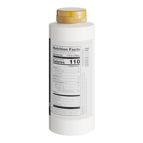 A white Capora bottle of Chocolate Flavoring Sauce with a yellow label.