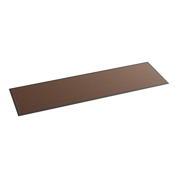 A brown rectangular mat with black trim.