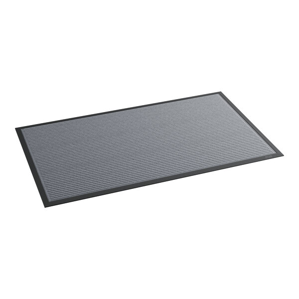 A grey rectangular mat with black border.